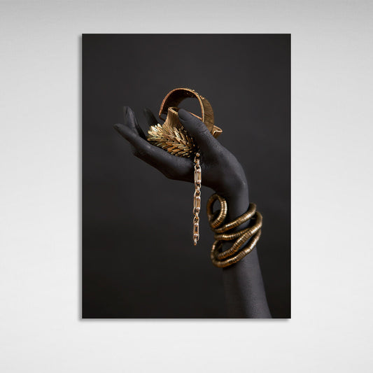 The black hand of a woman with gold jewelry Canvas Wall Art Print