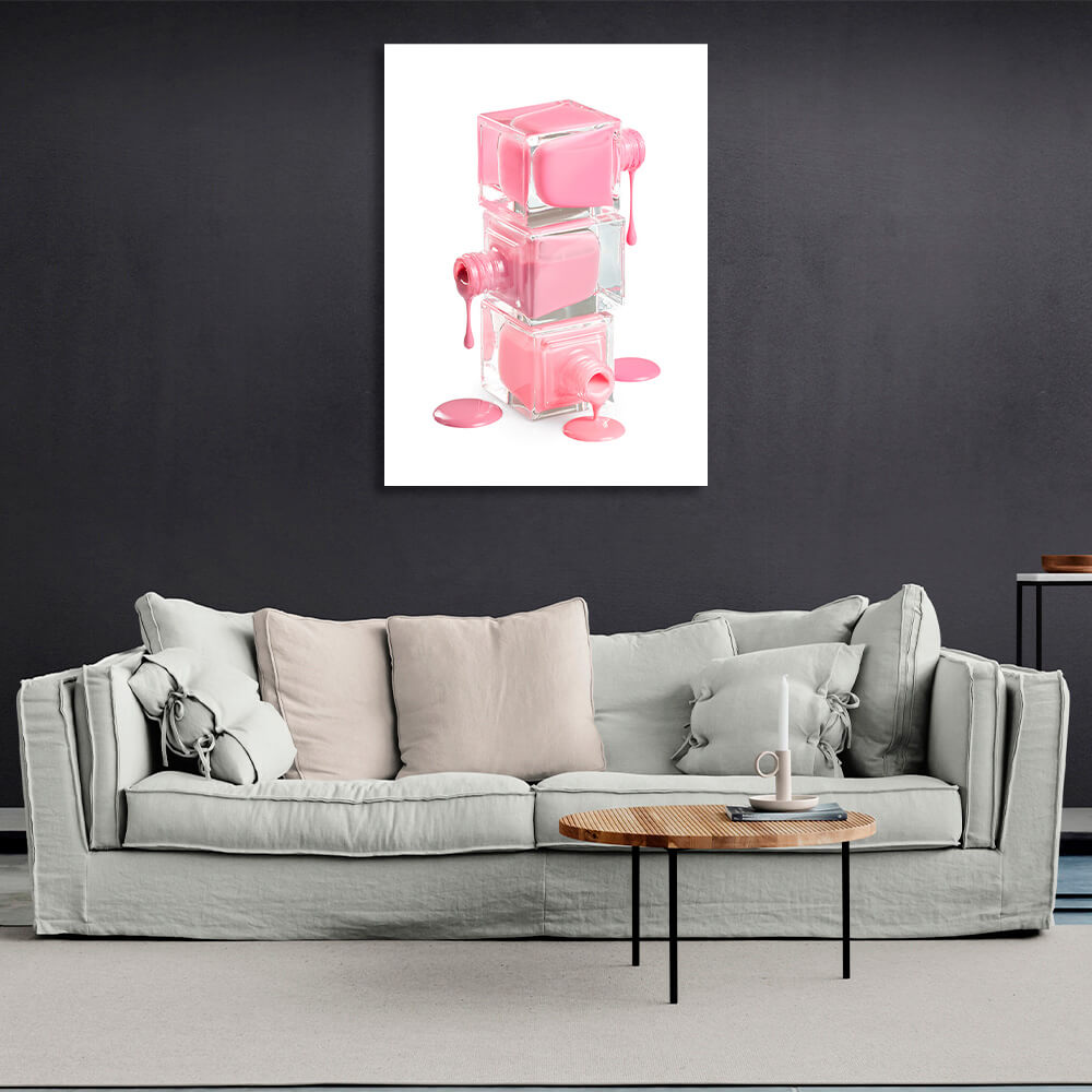 Three cans of pink spilled nail polish Canvas Wall Art Print