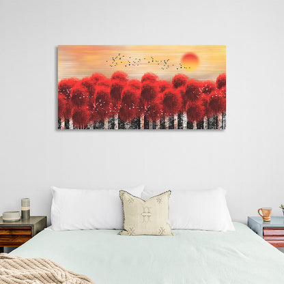 A forest of trees with red tops against a backdrop of sunset and birds Canvas Wall Art Print