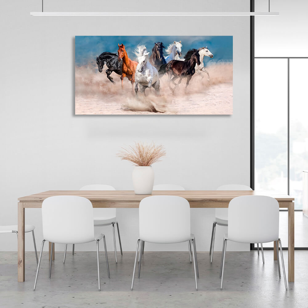 Horizontal picture of 7 horses running through the desert on the background of blue sky Canvas Wall Art Print