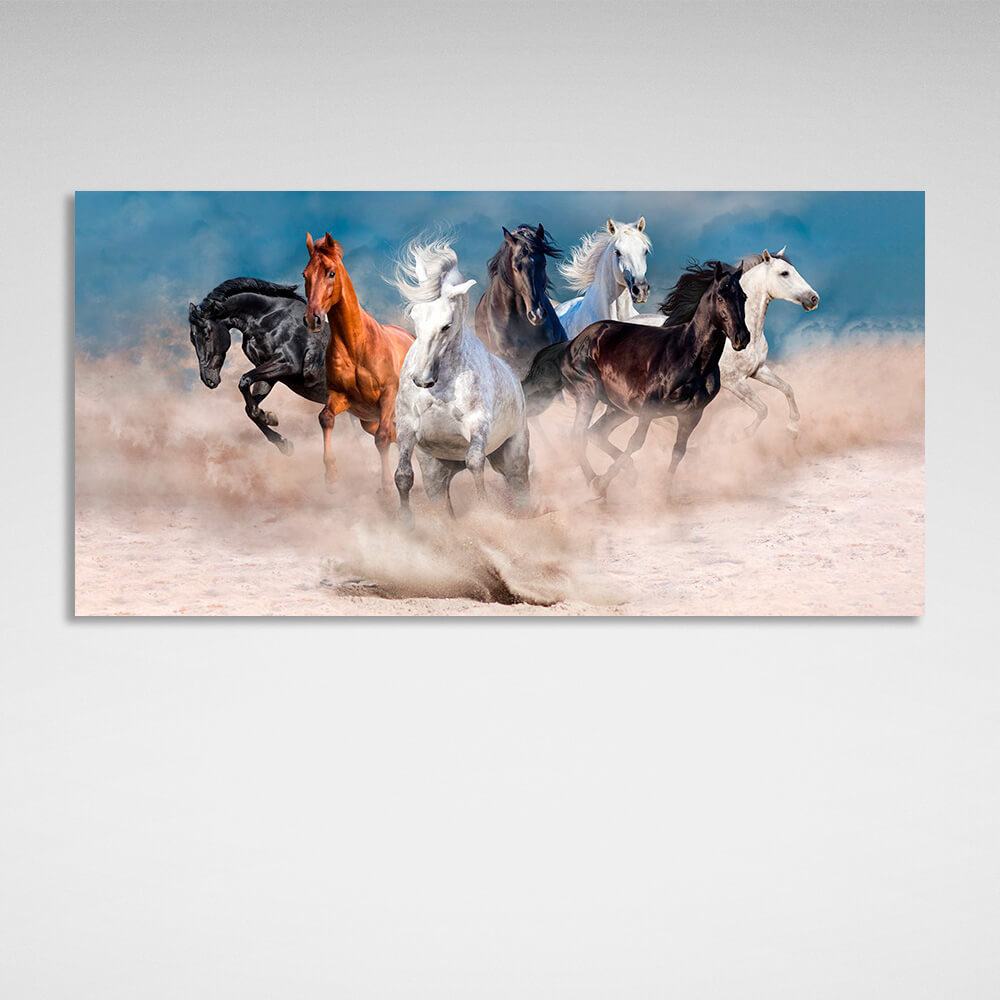 Horizontal picture of 7 horses running through the desert on the background of blue sky Canvas Wall Art Print