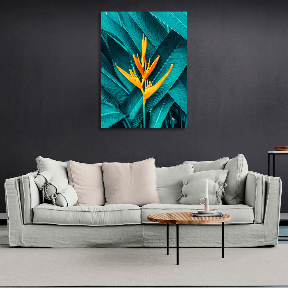 Yellow heliconia against its own green leaves Canvas Wall Art Print