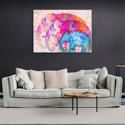 Three elephants of different sizes two of them are drawn in pink colors one in blue colors Canvas Wall Art Print