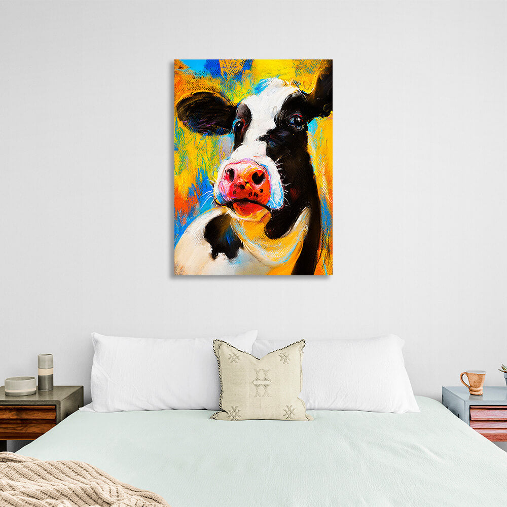 Black and white cow on a yellow and blue background Canvas Wall Art Print