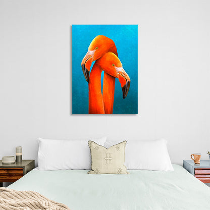 Two orange flamingos on a blue background Canvas Wall Art Print