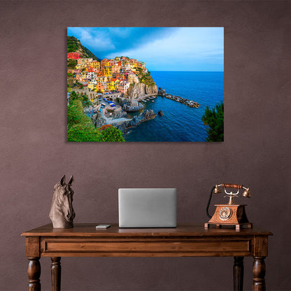 A town with colorful houses near the sea on a cliff Canvas Wall Art Print