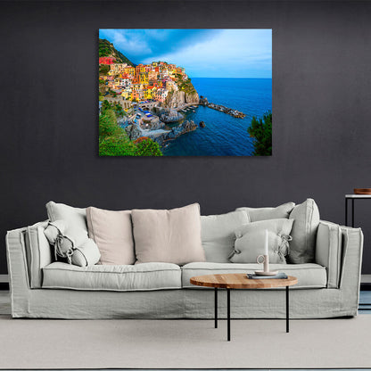 A town with colorful houses near the sea on a cliff Canvas Wall Art Print