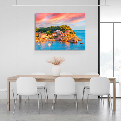 The blue sea around a small town near a cliff Canvas Wall Art Print