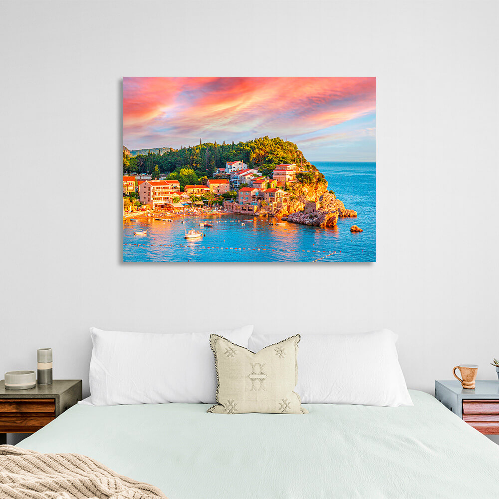 The blue sea around a small town near a cliff Canvas Wall Art Print