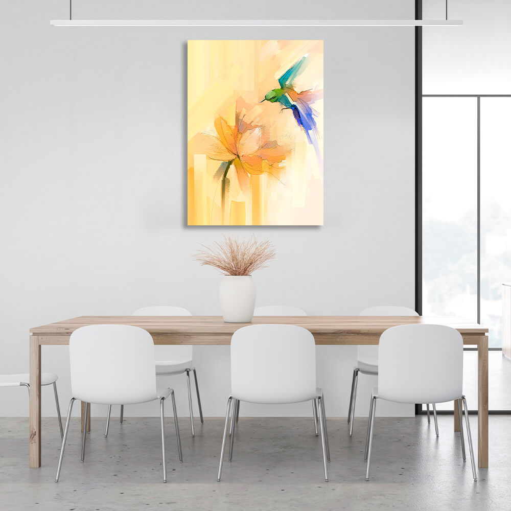 A hummingbird over a flower in light colors Canvas Wall Art Print