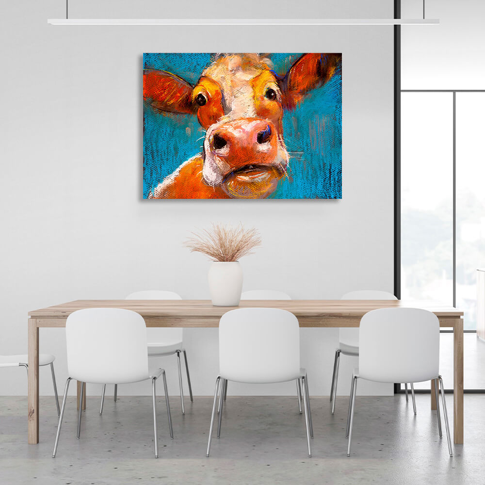 Surprised cow on a blue background Canvas Wall Art Print