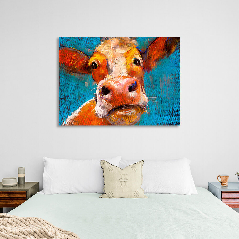 Surprised cow on a blue background Canvas Wall Art Print