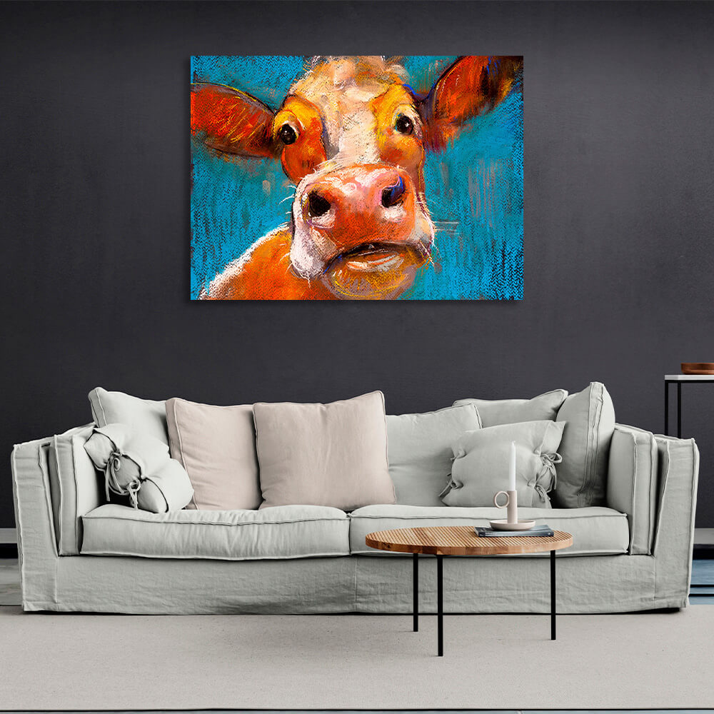 Surprised cow on a blue background Canvas Wall Art Print