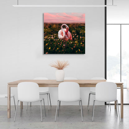 Pink flamingo in a field of flowers background Canvas Wall Art Print