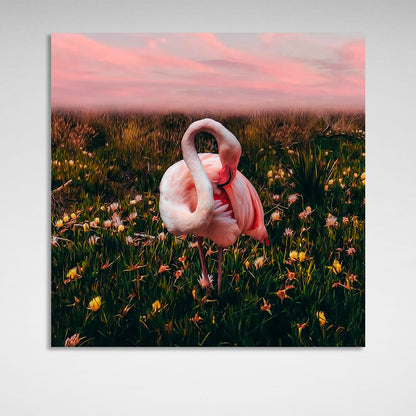 Pink flamingo in a field of flowers background Canvas Wall Art Print