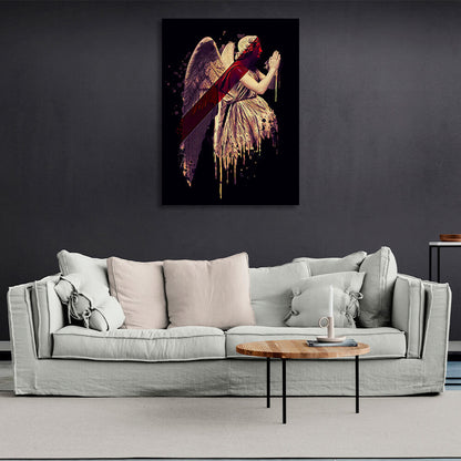 Gold angel with red detail on black background background Canvas Wall Art Print