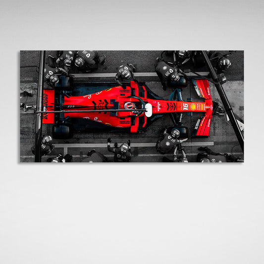 Formula 1 car with people in black suits Canvas Wall Art Print