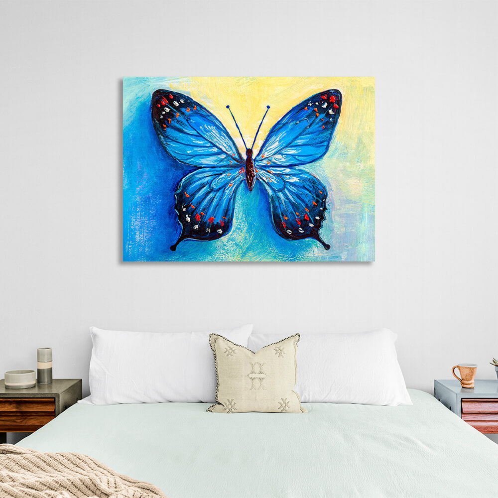 Blue butterfly on a blue-yellow background Canvas Wall Art Print