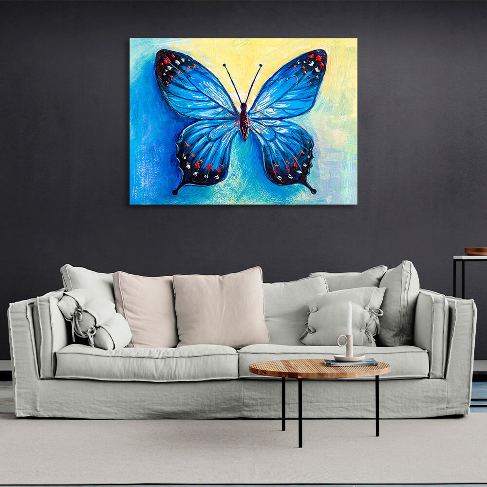 Blue butterfly on a blue-yellow background Canvas Wall Art Print