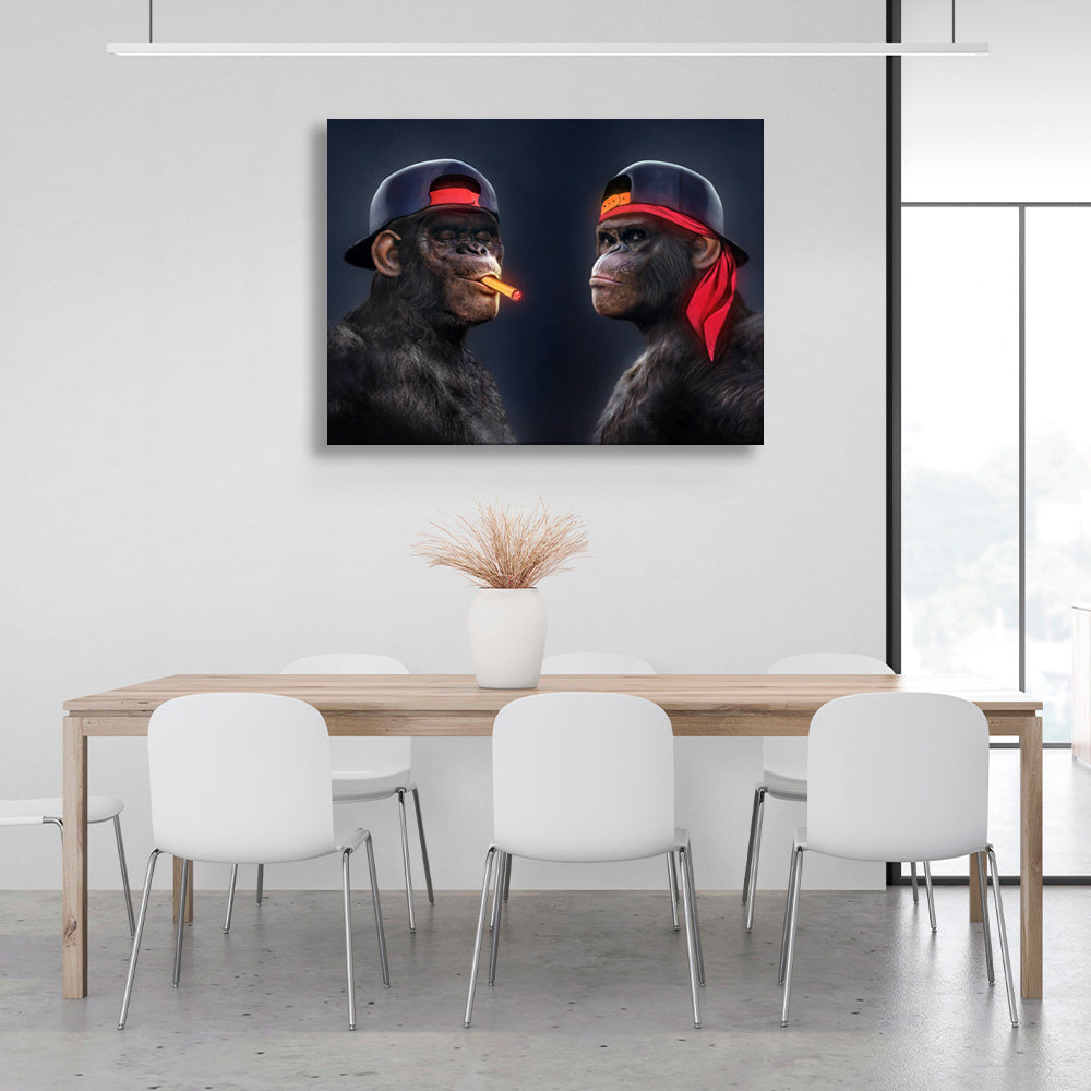 Two black gorillas with caps and one cigar Canvas Wall Art Print