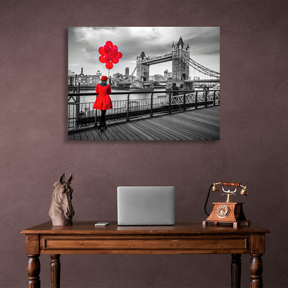 A woman in a red coat and red balloons in the background of London Bridge Canvas Wall Art Print