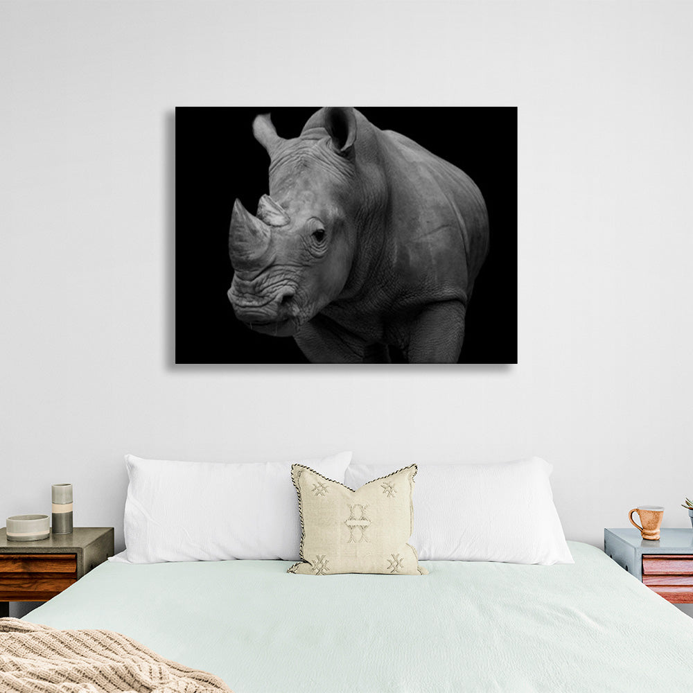 Rhinoceros on black background Canvas Wall Art Print