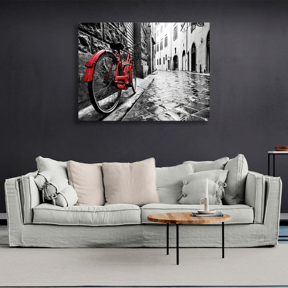 Black and white coloring of the street with a bright red bicycle Canvas Wall Art Print