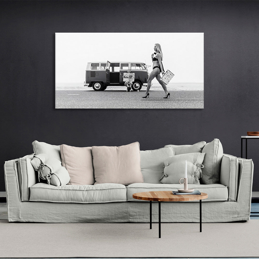 A girl in a swimsuit with heels in the background of an old bus Canvas Wall Art Print