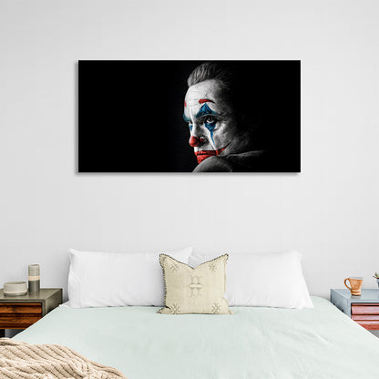 Joker on a black background Canvas Wall Art Print