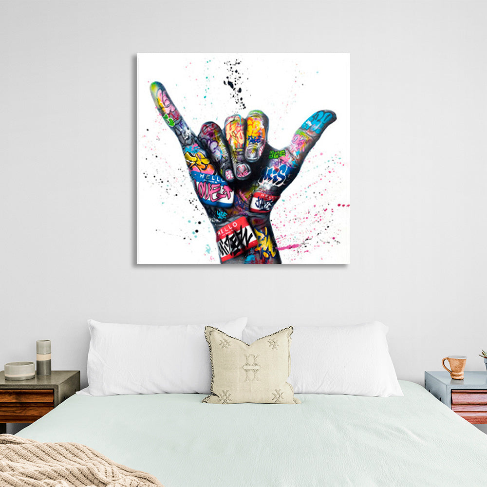 Hand in bright colors on a white background Canvas Wall Art Print