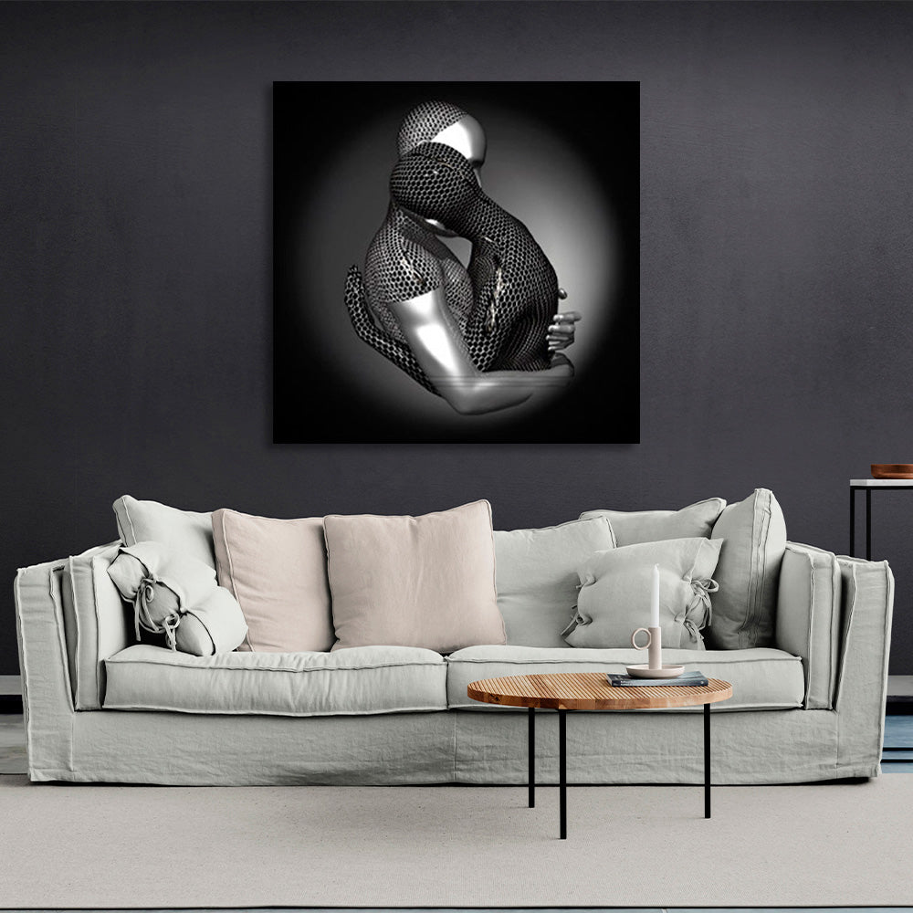 a couple under a gray light with a black background Canvas Wall Art Print