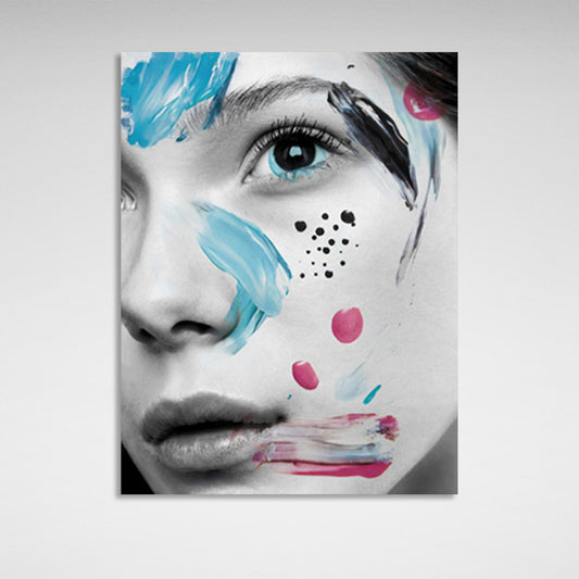 A girl with black eyes with smears of paint on her face Canvas Wall Art Print