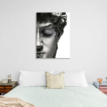 Half the face of a Greek statue on a white background Canvas Wall Art Print