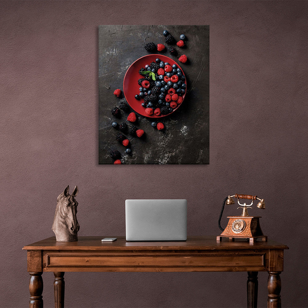 Berries in a red plate on a dark background Canvas Wall Art Print For Kitchen