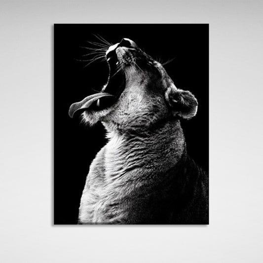 A lioness on a black background Canvas Wall Art Print