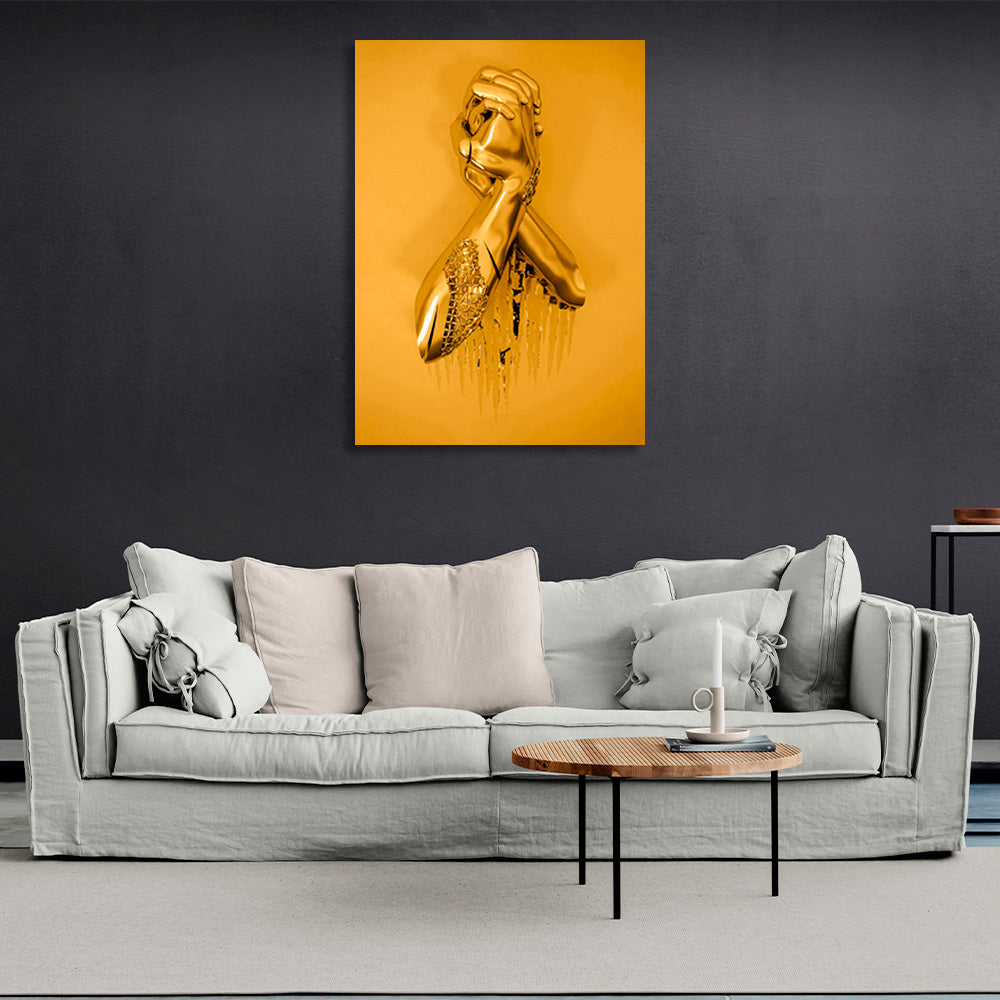 hands in gold color on a gold background Canvas Wall Art Print