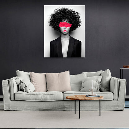 Curly girl in jacket on gray backgroundCanvas Wall Art Print