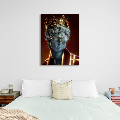 A sculpture in a crown and robe Canvas Wall Art Print