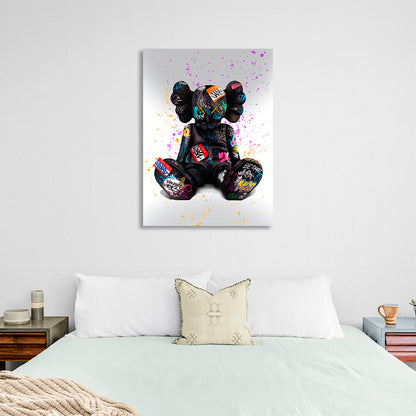 Black doll on a gray background with colored spots Canvas Wall Art Print