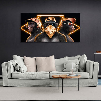 Three monkeys with gold accessories on a black background Canvas Wall Art Print