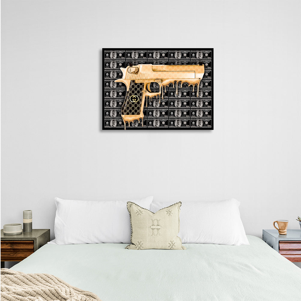 A gold gun against a background of black dollars Inspirational Canvas Wall Art Print