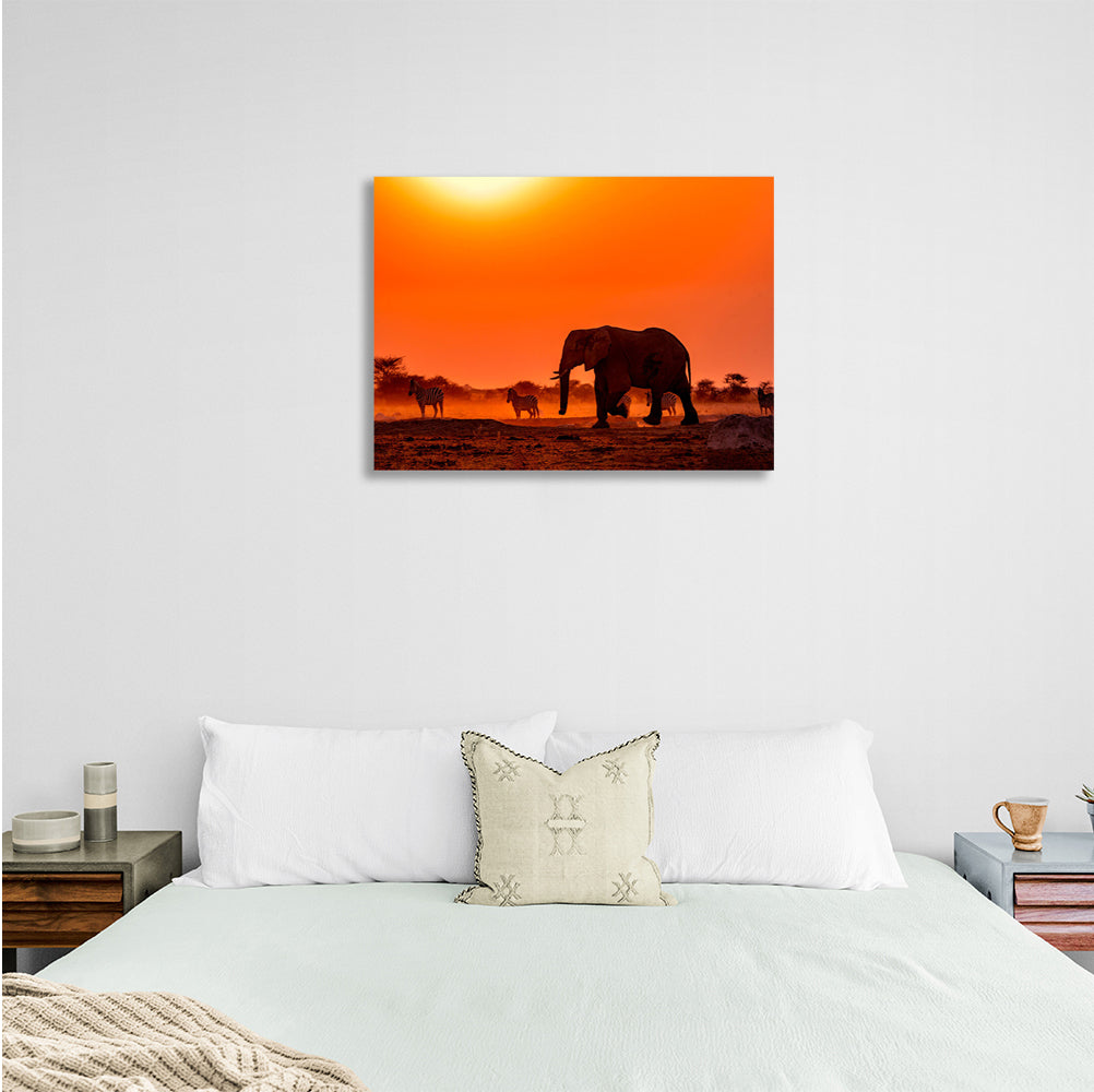 An elephant with zebras Canvas Wall Art Print