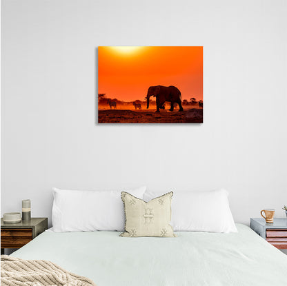 An elephant with zebras Canvas Wall Art Print