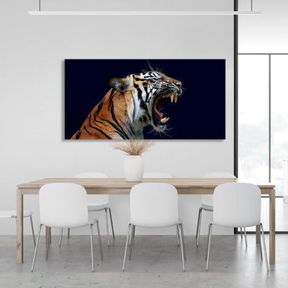 Roaring tigress on dark blue background Canvas Wall Art Print