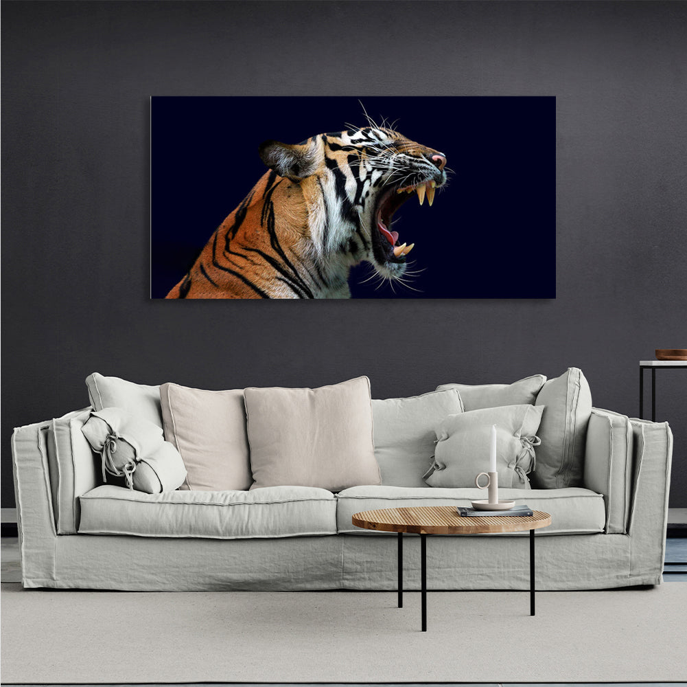 Roaring tigress on dark blue background Canvas Wall Art Print