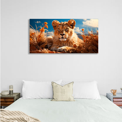 A young lion in the dry grass Canvas Wall Art Print