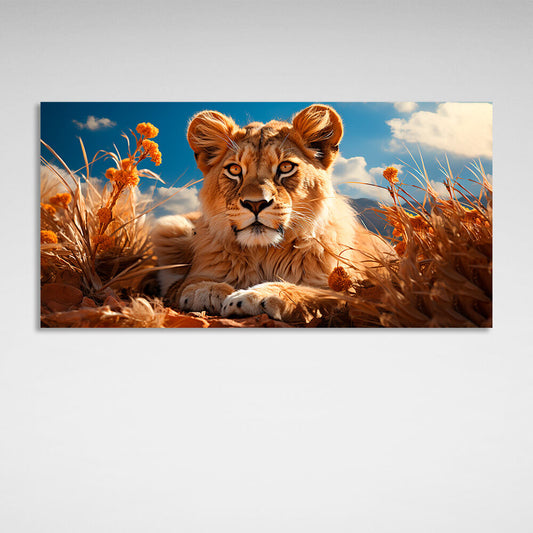 A young lion in the dry grass Canvas Wall Art Print